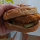 Side view of Pollo Campero fried chicken sandwich